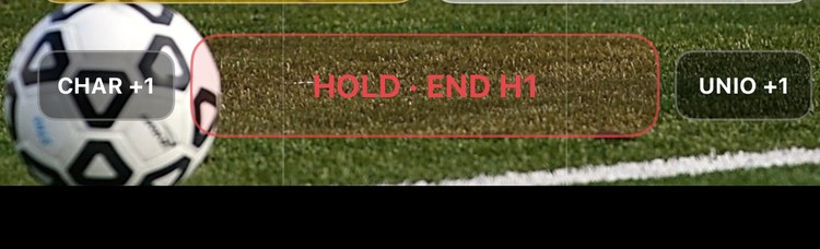 The score buttons either side of the hold-to-end button